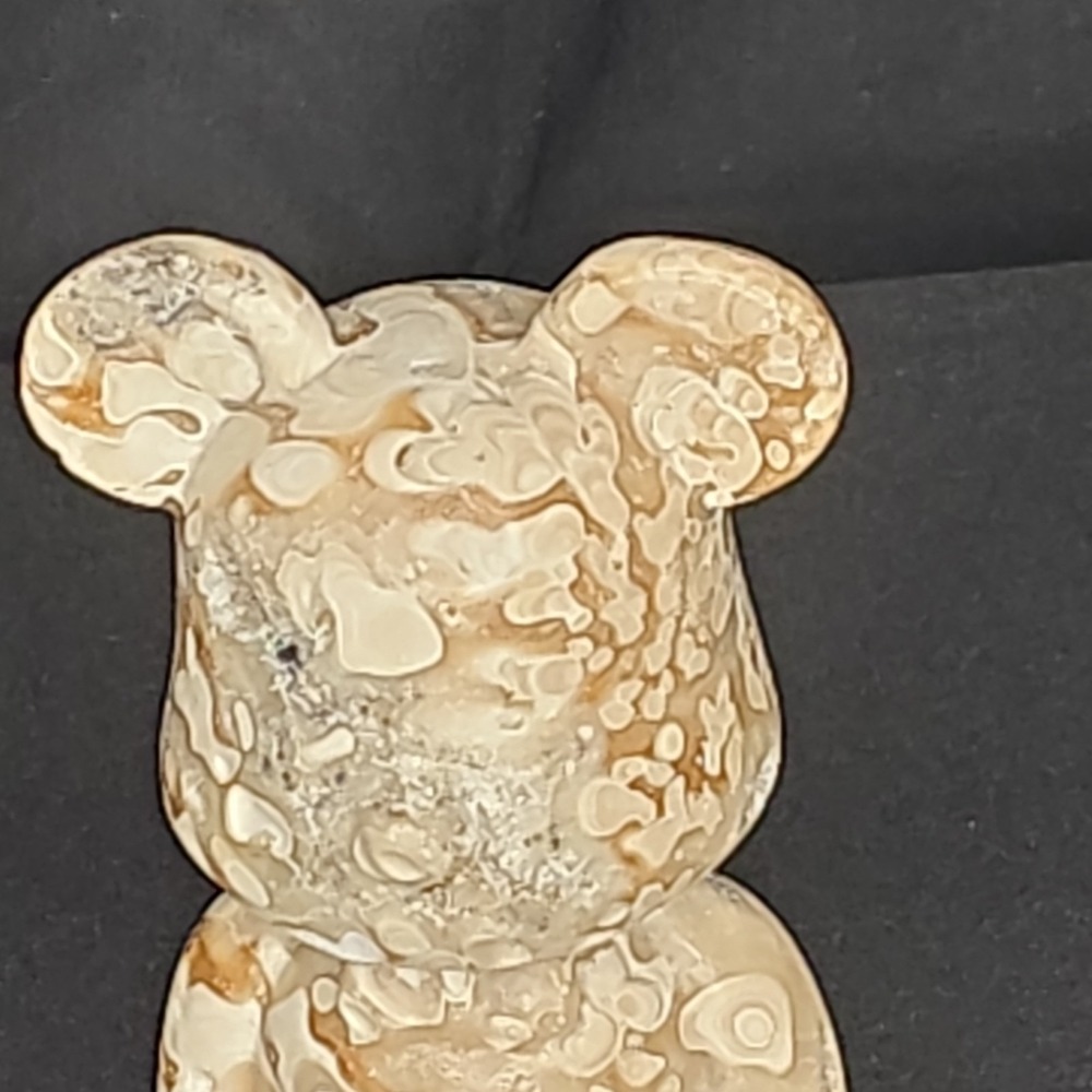 235 g a teddy bear figurine, made from stone jasper or a similar agate material.
